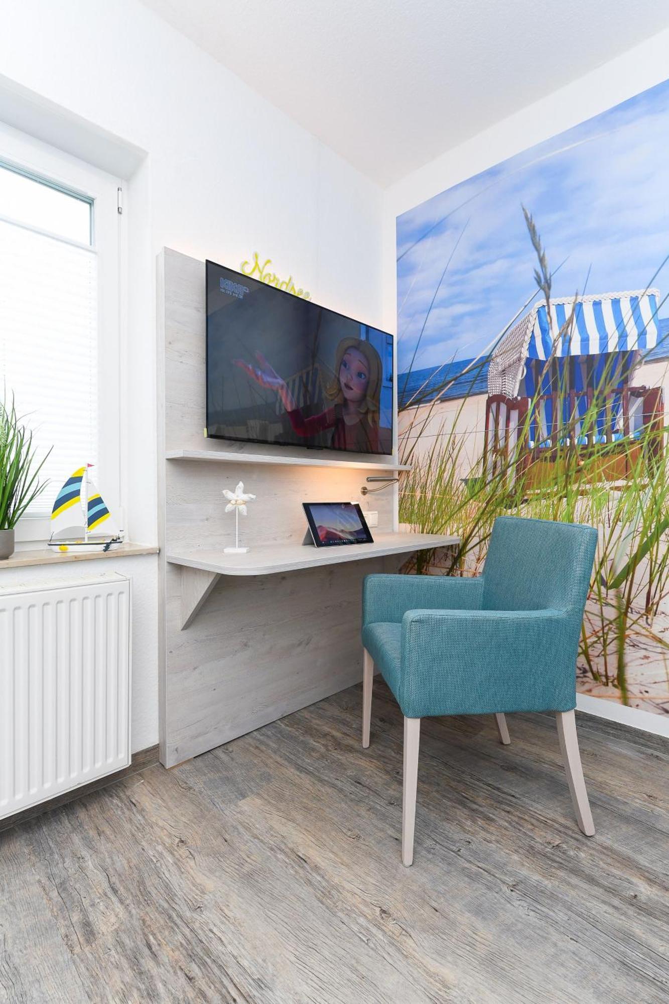Ferienwohnungen Im Haus Strandkorb Bensersiel Bagian luar foto
